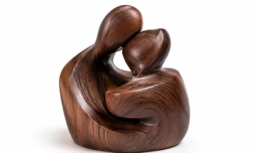 Modern abstract wooden sculpture on minimalist office desk