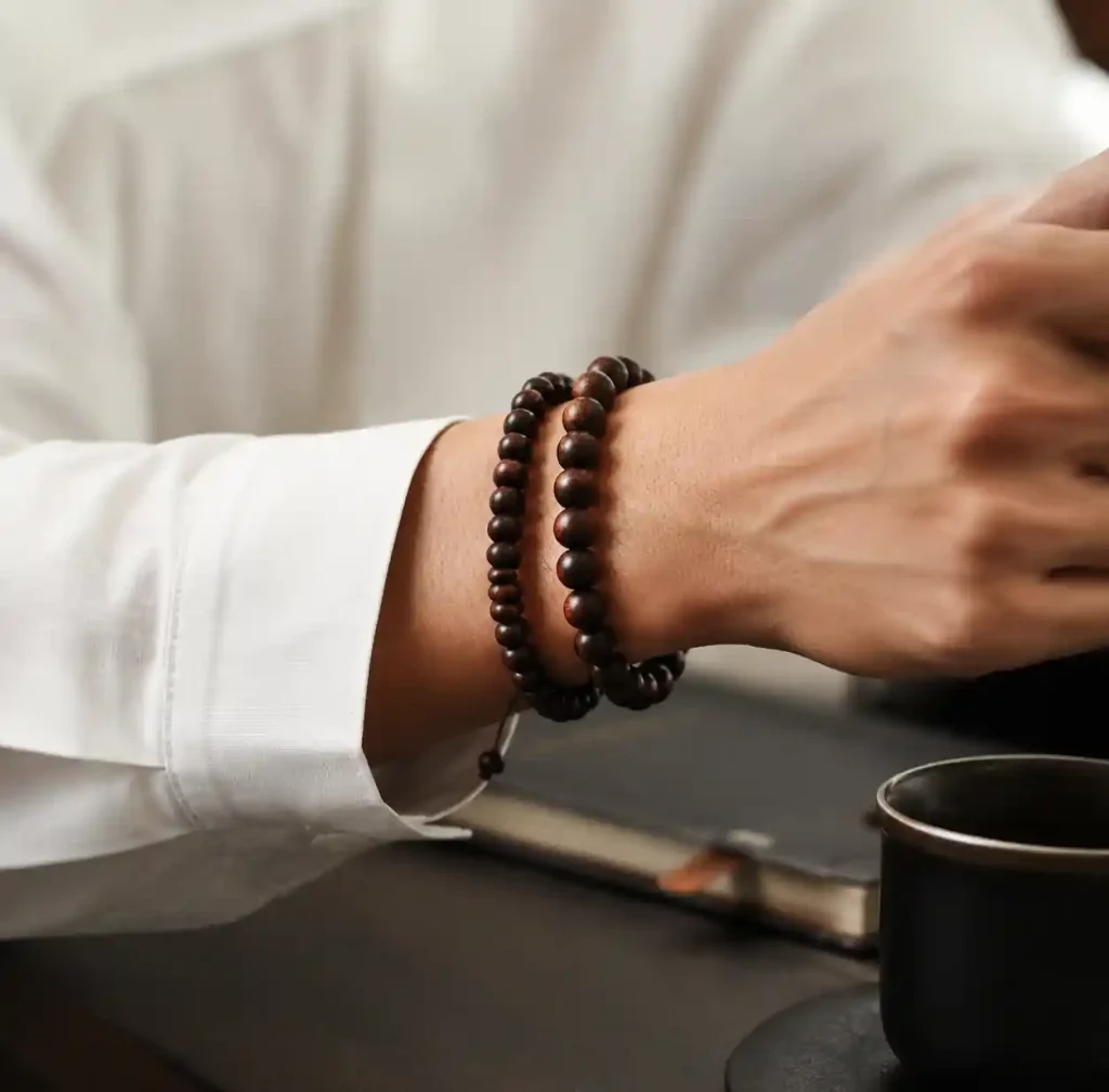 wooden bead bracelets styled on wrist showing professional and casual wearing options